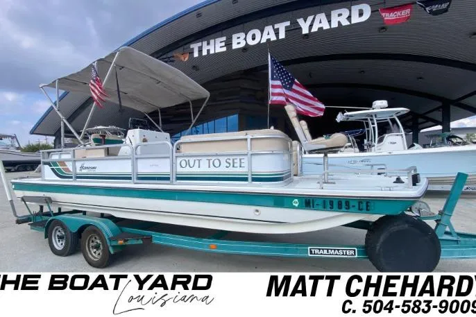 The Image of 1994 Hurricane FunDeck 226 boat on trailer at The Boat Yard, Louisiana. - 1