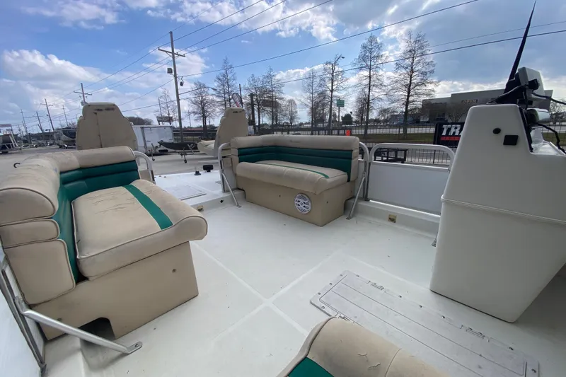 Slide: The Image of 1994 Hurricane FunDeck 226 boat interior with spacious seating and steering console. - 17