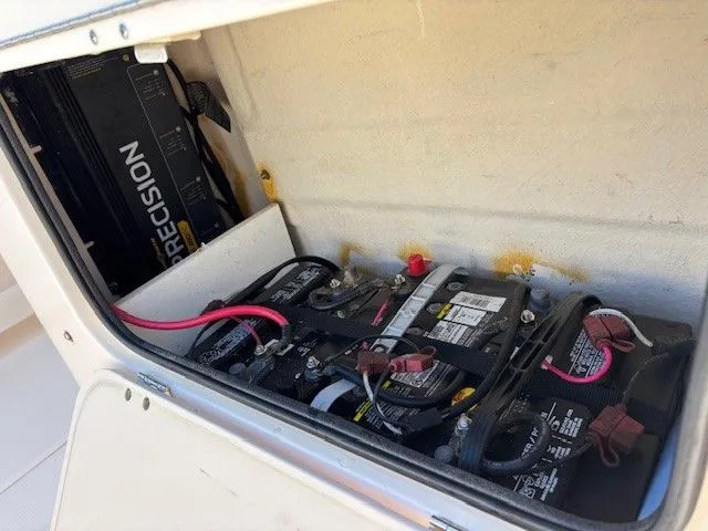 Slide: The Image of Battery compartment of a 2005 Grady-White Advance 257 boat. - 34