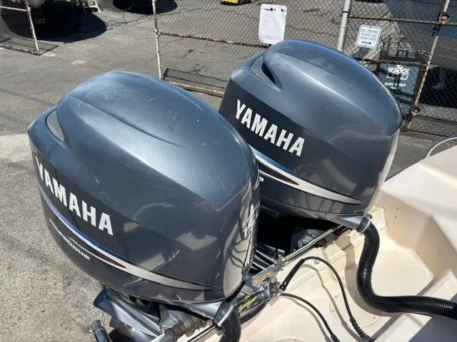 Slide: The Image of Two Yamaha outboard motors on a 2005 Grady-White Advance 257 boat. - 35