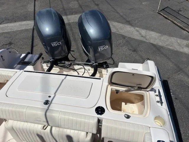 Slide: The Image of 2005 Grady-White Advance 257 boat with dual outboard engines. - 36