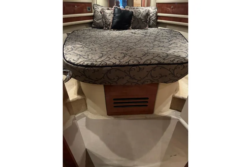 Slide: The Image of Luxurious 2003 Sea Ray 480 Sedan Bridge cabin with elegant bedding and cozy interior. - 18