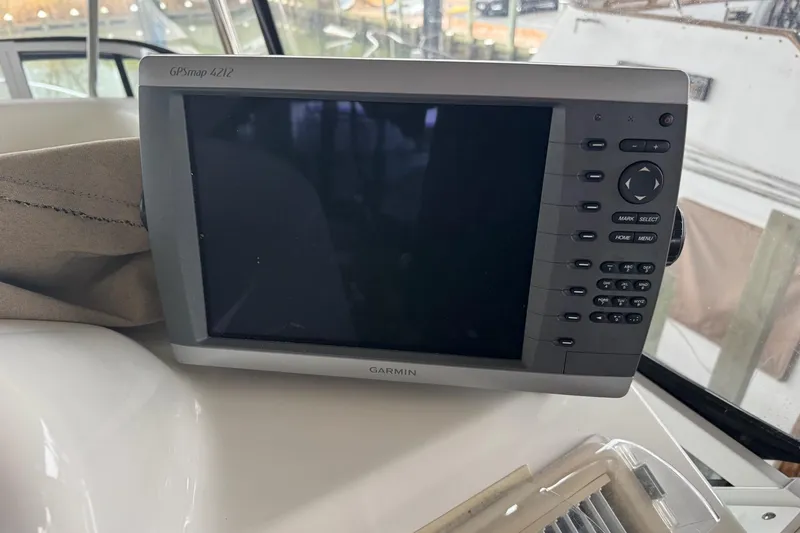 Slide: The Image of Garmin GPSmap 4212 on 2003 Sea Ray 480 Sedan Bridge yacht dashboard. - 33