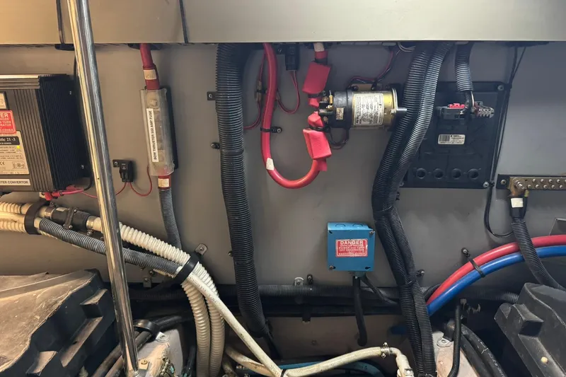 Slide: The Image of Engine room wiring of a 2003 Sea Ray 480 Sedan Bridge yacht. - 49