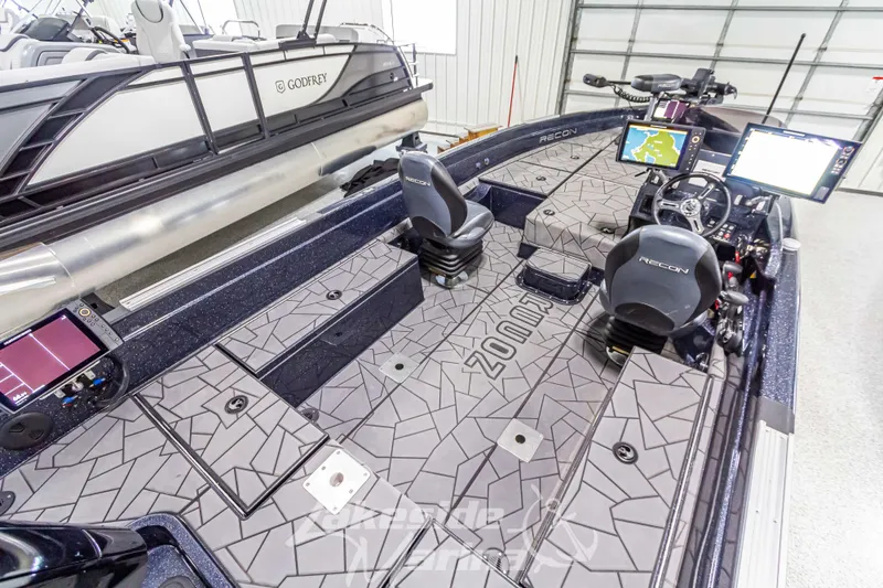Slide: The Image of Interior view of 2024 Recon 2185 SC boat. - 13