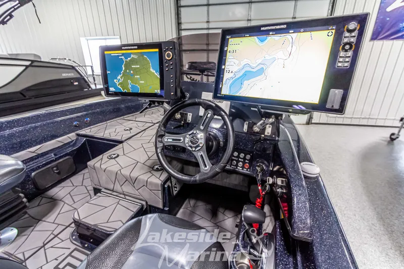 Slide: The Image of Interior of 2024 Recon 2185 SC with navigation screens. - 25