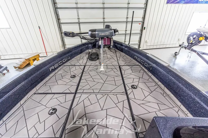 Slide: The Image of 2024 Recon 2185 SC boat with modern interior design. - 37