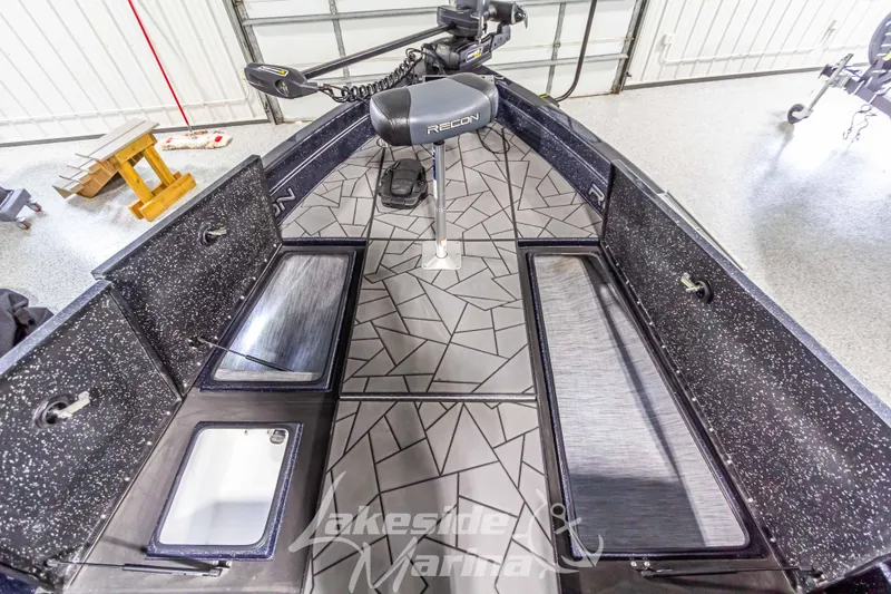 Slide: The Image of Interior view of the 2024 Recon 2185 SC boat. - 38