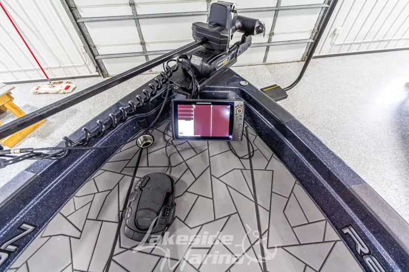 Slide: The Image of 2024 Recon 2185 SC boat with advanced electronics. - 39