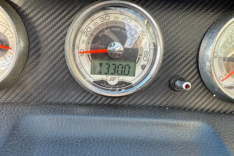 Slide: The Image of Speedometer of 2014 Four Winns SL242 boat showing 731 hours. - 13