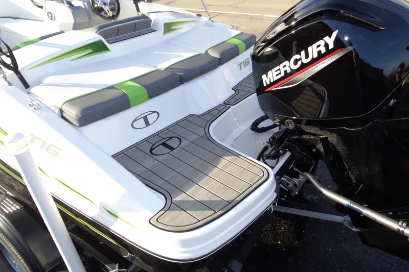 Slide: The Image of 2023 Tahoe T16 boat with Mercury engine, featuring sleek design and modern seating. - 17