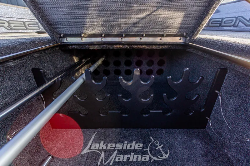 Slide: The Image of 2024 Recon 985 SC boat rod storage compartment at Lakeside Marina. - 24