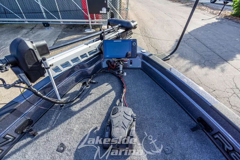 Slide: The Image of 2024 Recon 985 SC boat with advanced navigation system and foot pedal control. - 30