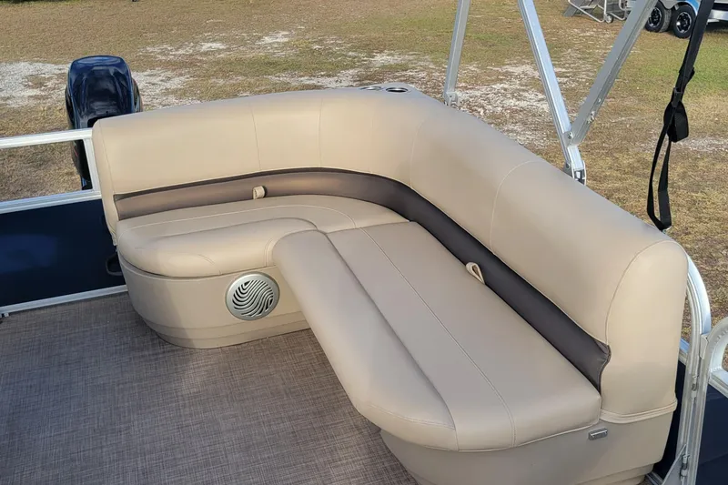 Slide: The Image of 2021 Sun Tracker Bass Buggy 16 XL Select pontoon boat with beige seating. - 9