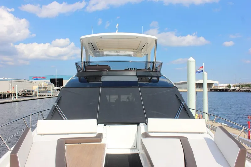 Slide: The Image of 2018 Galeon 640 Fly yacht docked at marina, aerial view. - 10