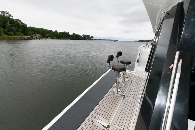 Slide: The Image of Luxurious 2018 Galeon 640 Fly yacht docked in scenic marina. - 16