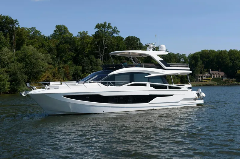 Slide: The Image of Luxurious 2018 Galeon 640 Fly yacht cruising on a serene lake. - 2