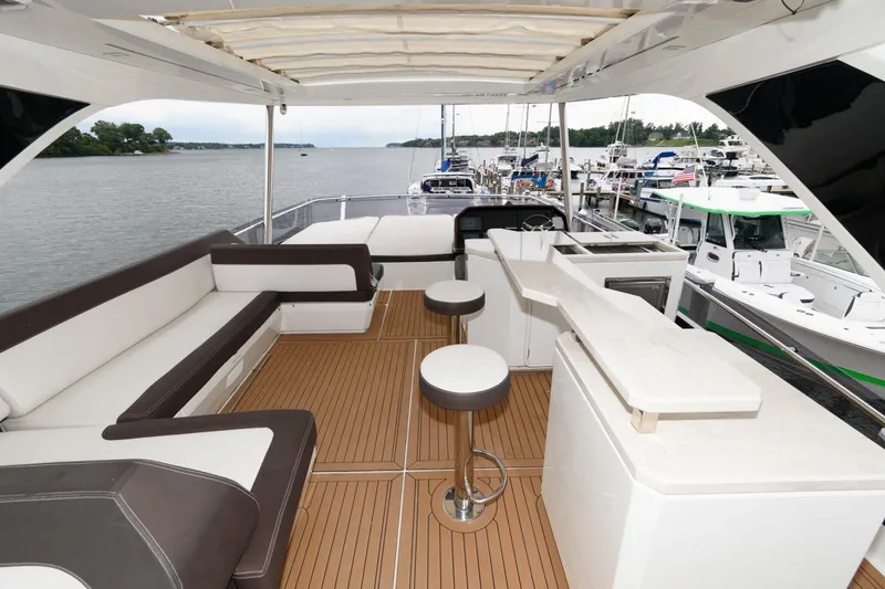 Slide: The Image of Galeon 640 Fly 2018 yacht helm with modern navigation equipment at marina. - 30