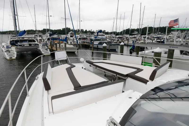 Slide: The Image of 2018 Galeon 640 Fly yacht docked at marina, view from helm station. - 39