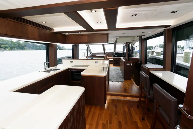 Slide: The Image of Galeon 640 Fly 2018 yacht docked, showcasing sleek design and modern deck features. - 41