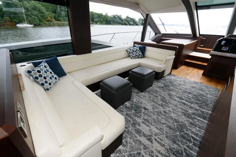 Slide: The Image of Luxurious interior of 2018 Galeon 640 Fly yacht with modern kitchen and seating area. - 45