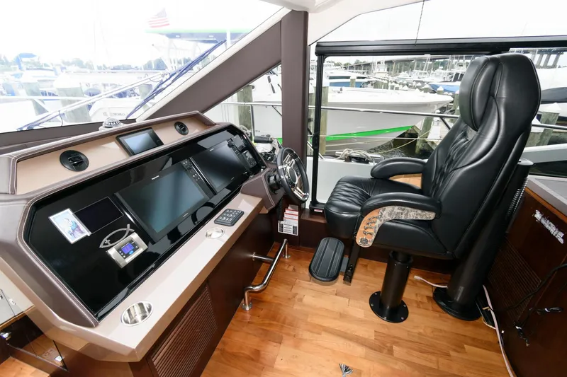 Slide: The Image of Luxurious interior of 2018 Galeon 640 Fly yacht with elegant seating and scenic water view. - 49