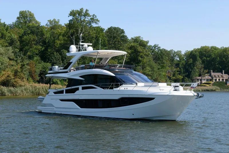 Slide: The Image of Luxurious 2018 Galeon 640 Fly yacht cruising on a serene river. - 5