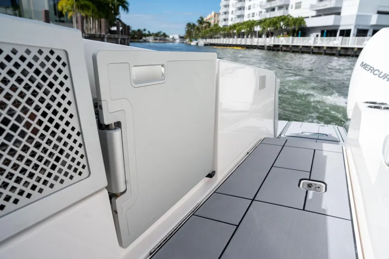 Slide: The Image of 2022 Aviara AV32 OB boat deck with open hatch, dockside view. - 15