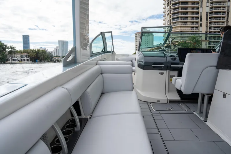Slide: The Image of Luxurious 2022 Aviara AV32 OB boat interior with sleek seating and modern dashboard. - 18