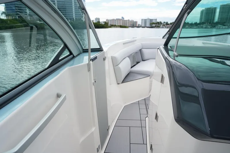 Slide: The Image of 2022 Aviara AV32 OB boat interior with sleek design and waterfront view. - 21
