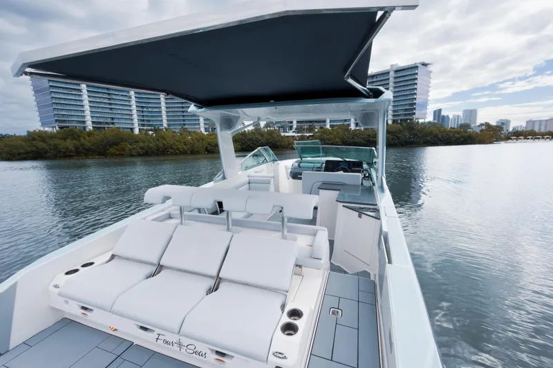 Slide: The Image of 2022 Aviara AV32 OB luxury boat with sleek design on calm water. - 28