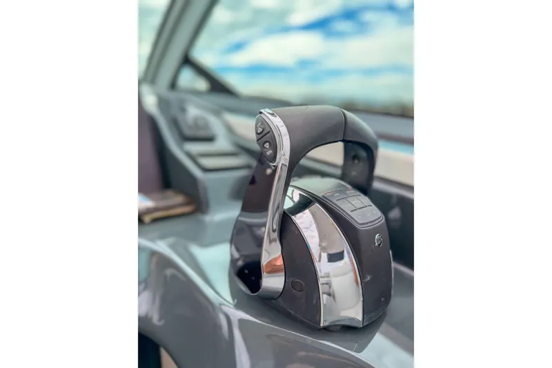 Slide: The Image of Throttle control of 2022 Aviara AV32 OB boat, featuring sleek design and modern technology. - 36