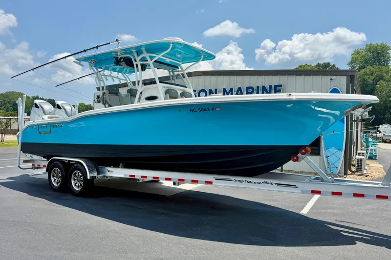 The Image of 2025 Key West 291 FS boat on trailer at Proud & Son Marine dealership. - 0