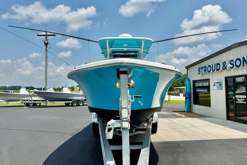 Slide: The Image of 2025 Key West 291 FS boat on trailer at Stroud & Son Marine dealership. - 9
