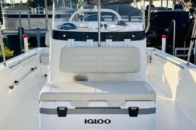 Slide: The Image of 2025 Boston Whaler 190 Montauk boat interior with Igloo cooler and seating. - 9