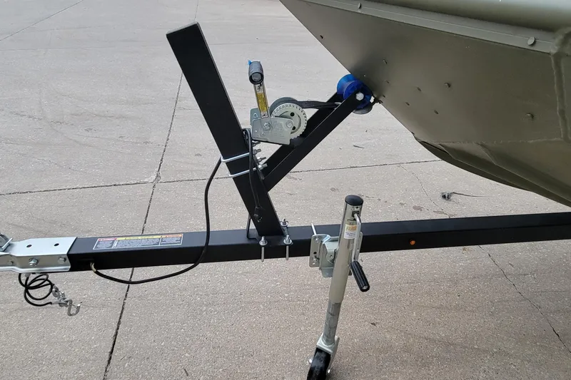 Slide: The Image of Trailer hitch and winch system of 2025 Lowe L1648M Aura Jon boat. - 4