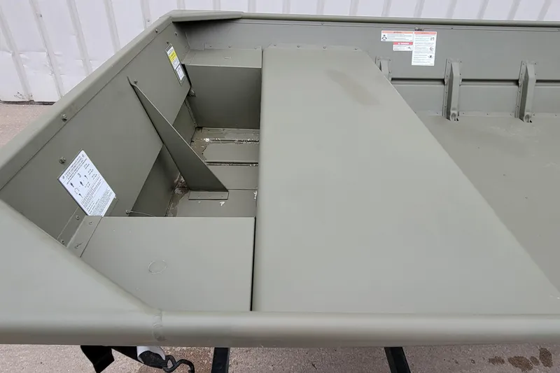 Slide: The Image of 2025 Lowe L1648M Aura Jon boat interior, showcasing durable construction and spacious design. - 8