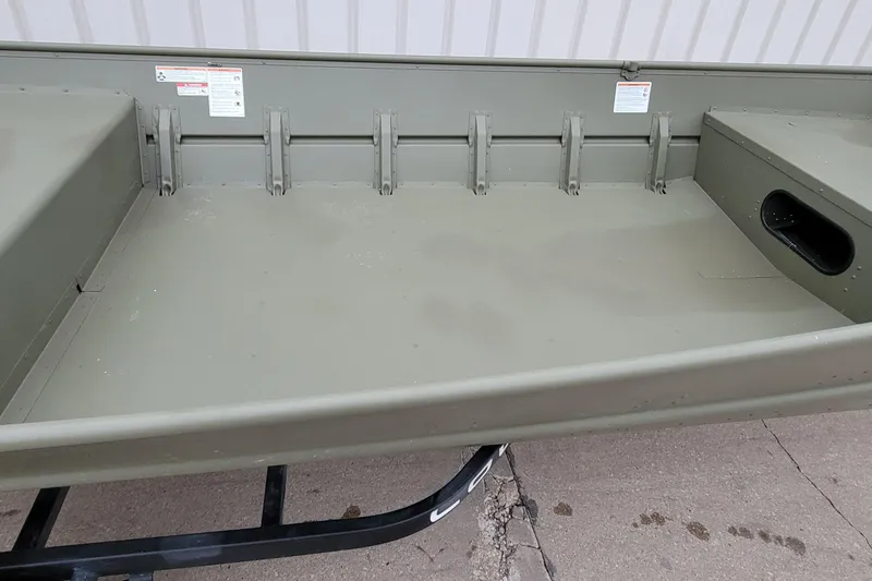 Slide: The Image of 2025 Lowe L1648M Aura Jon boat interior, showcasing spacious, durable design. - 9