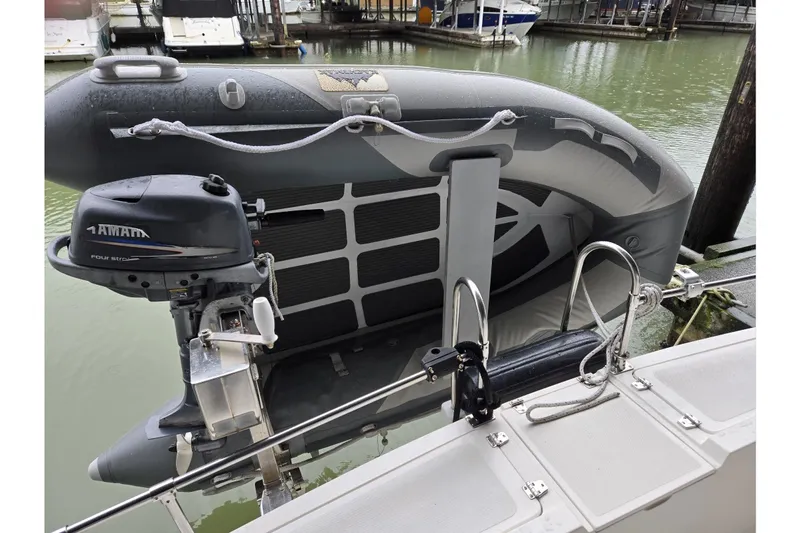 Slide: The Image of Inflatable boat with Yamaha motor on 2001 Commander Flybridge Sedan. - 26