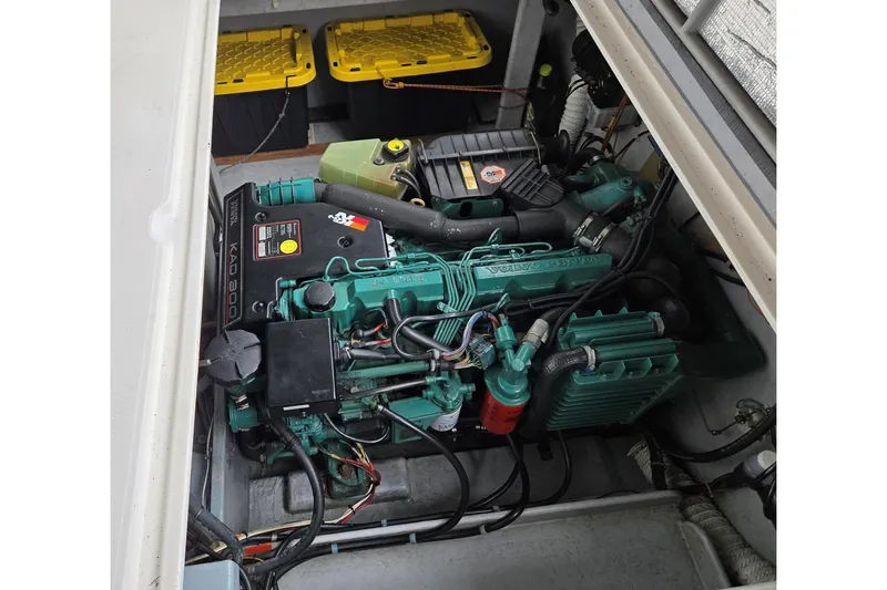 Slide: The Image of Engine compartment of 2001 Commander Flybridge Sedan with Volvo Penta KAD 300 engine. - 45