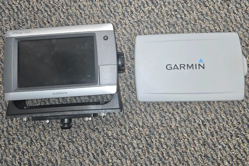 Slide: The Image of Garmin GPSmap 740s marine navigation device on carpet, suitable for 2001 Commander Flybridge Sedan. - 60