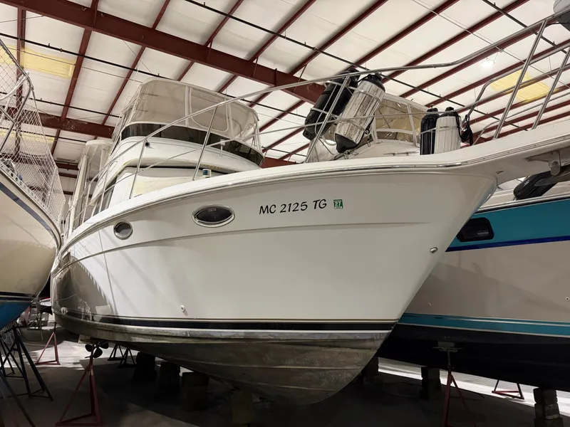 Slide: The Image of 2001 Carver 356 Aft Cabin Motor Yacht in storage facility. - 2