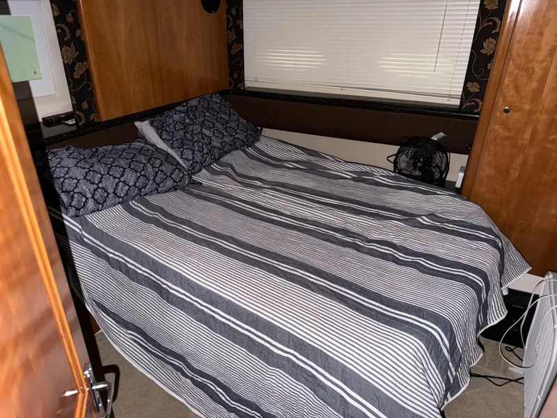 Slide: The Image of Bedroom in a 2001 Carver 356 Aft Cabin Motor Yacht. - 24