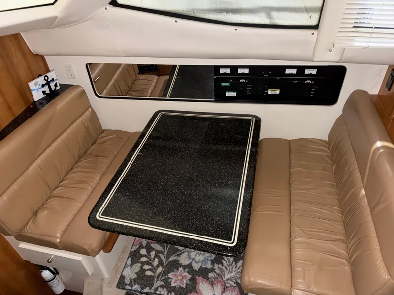Slide: The Image of Interior of 2001 Carver 356 Aft Cabin Motor Yacht with dining table. - 32