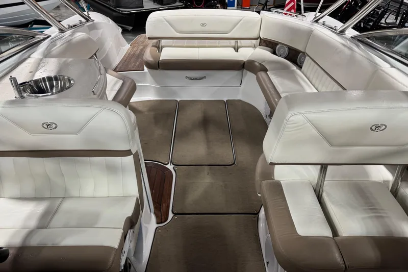 Slide: The Image of Luxurious 2011 Cobalt boat interior with plush seating and built-in sink. - 12