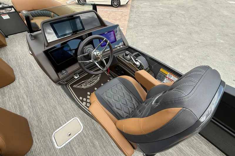 Slide: The Image of Luxurious helm of 2026 Bennington 27 QSBAT2 boat with modern controls and seating. - 15
