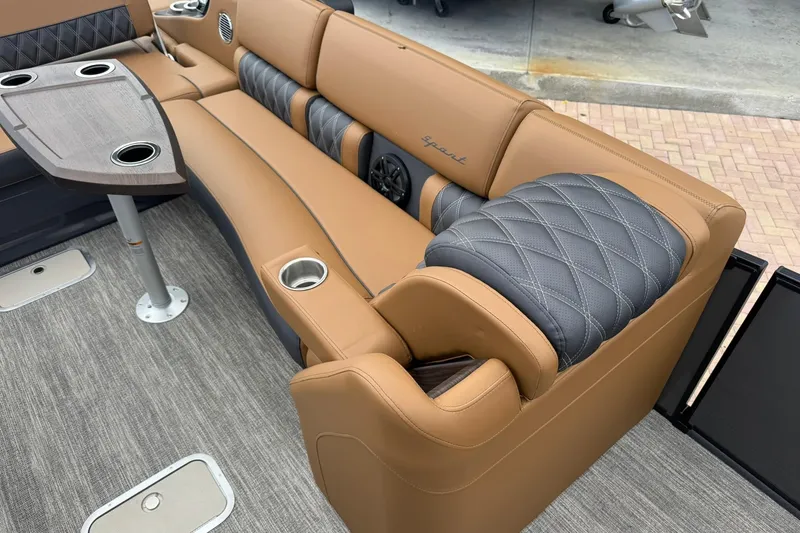Slide: The Image of Luxurious seating on 2026 Bennington 27 QSBAT2 boat with tan and gray upholstery. - 17