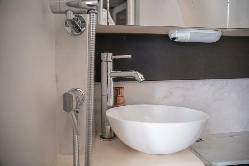 Slide: The Image of Modern bathroom sink and faucet on 2020 Scout 380 LXF boat. - 18