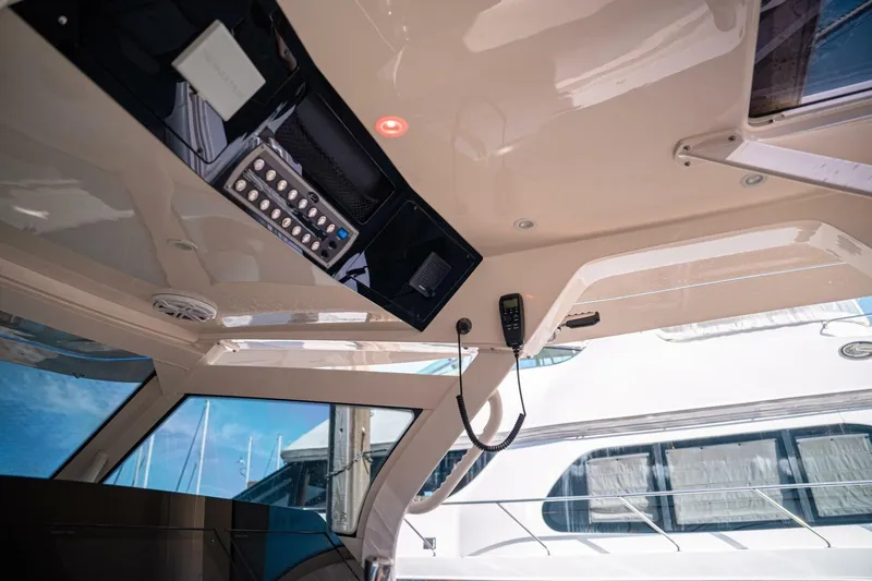 Slide: The Image of Interior view of 2020 Scout 380 LXF boat cockpit with control panel. - 25