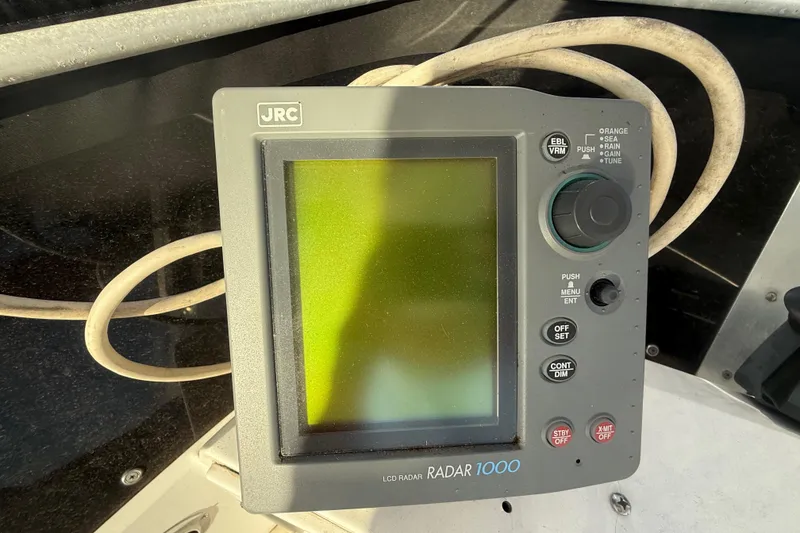 Slide: The Image of JRC Radar 1000 display on 1988 Phoenix 29 SFX Convertible boat. - 10